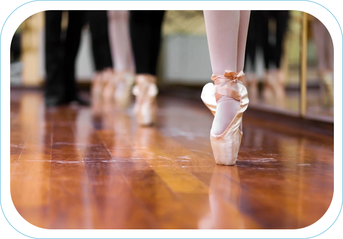 A close up of the feet of two dancers